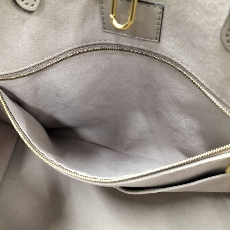 Louis Vuitton On The Go MM 2-Way Handbag Bicolor Monogram Empreinte Tourtrail