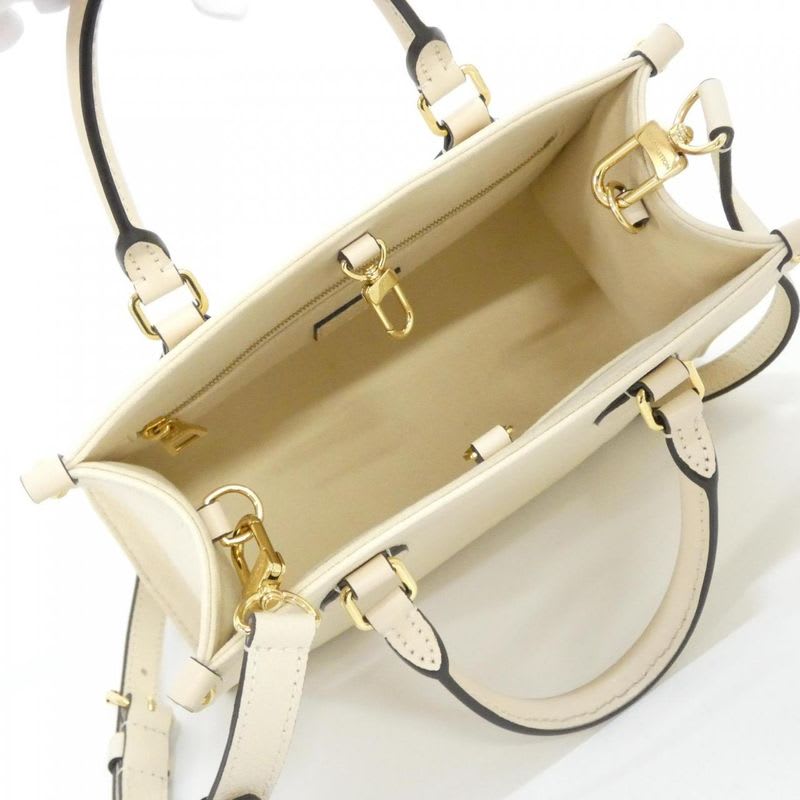Louis Vuitton Monogram Empreinte On The Go PM Bag