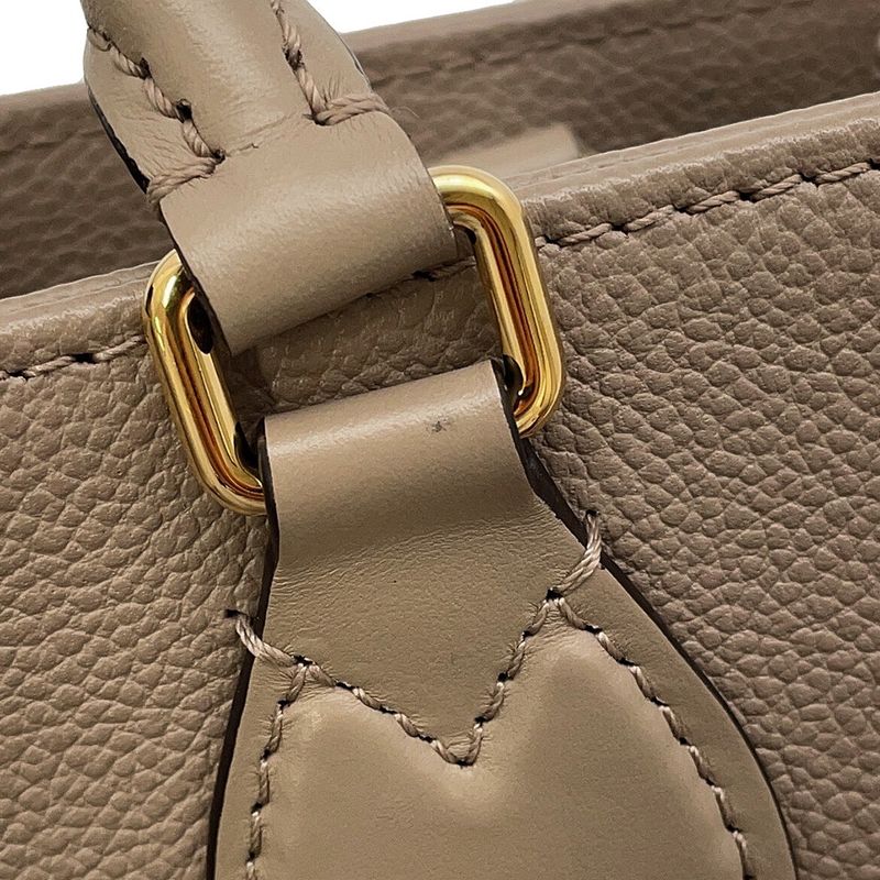 Louis Vuitton Tote Monogram Empreinte on the Go MM Tourtrail