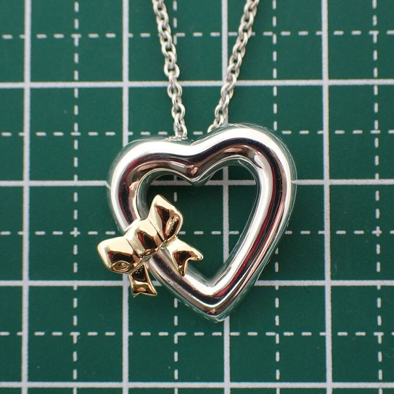 Tiffany & Co. 925 750 Ribbon Pendant