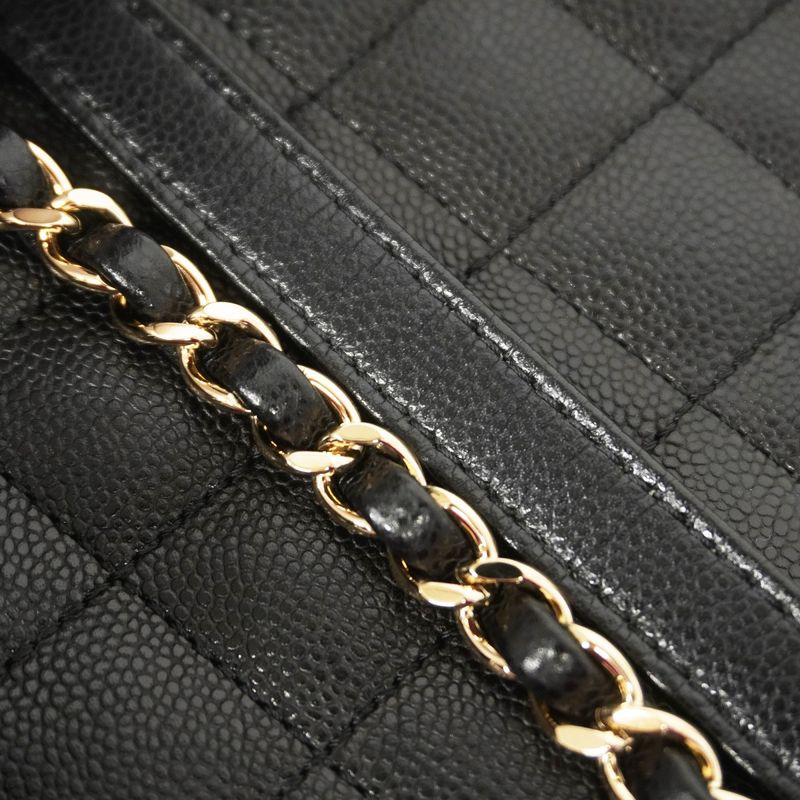 Chanel Backpack Quilted Caviar Leather Black Champagne Gold