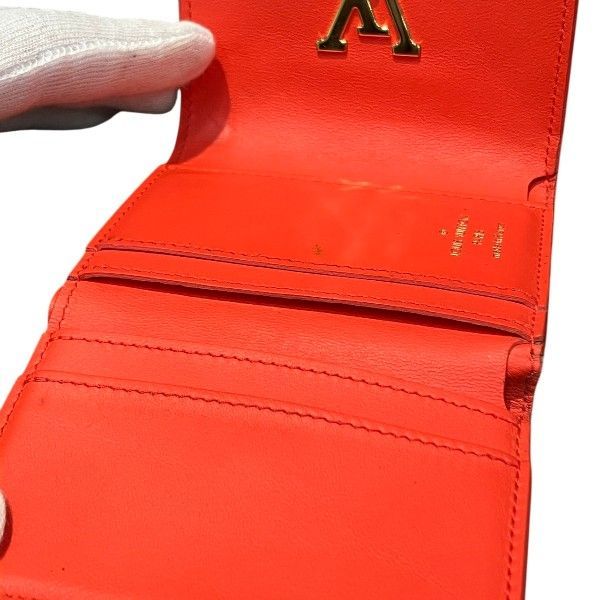 Louis Vuitton Taurillon Portefeuille Capucines XS Trifold Wallet Coral Tahiti