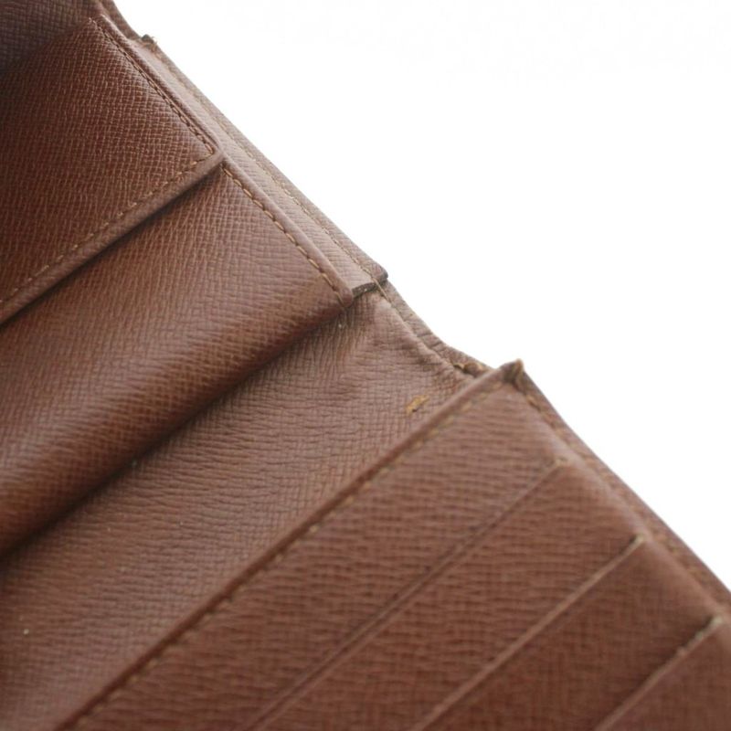 Louis Vuitton Monogram Porte Tresor International Wallet Logo