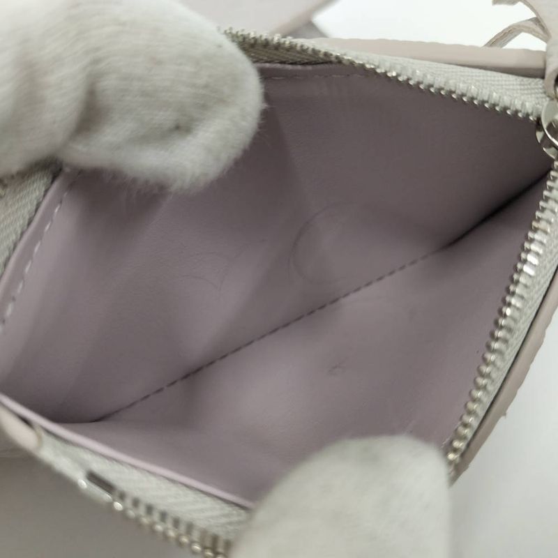 Louis Vuitton Portefeuille Victorine Monogram Empreinte Bloom Wallet