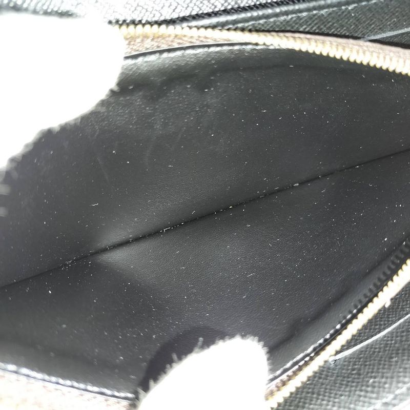 Louis Vuitton Portefeuille Sarah Bifold Wallet Monogram Giant Reverse