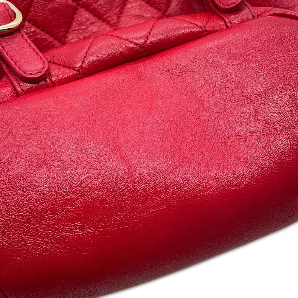 Chanel Quilted CC Logo Leather Backpack — view 9