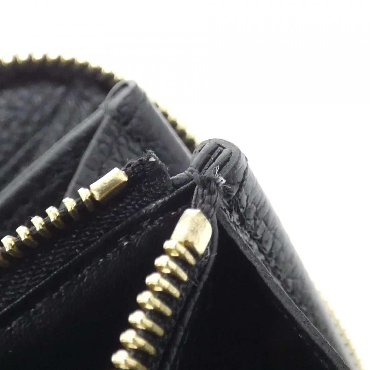 Louis Vuitton Monogram Empreinte Zippy Wallet — view 8