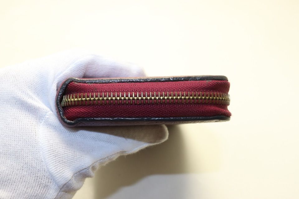 Louis Vuitton Monogram Empreinte Leather Zip Around Wallet — view 9