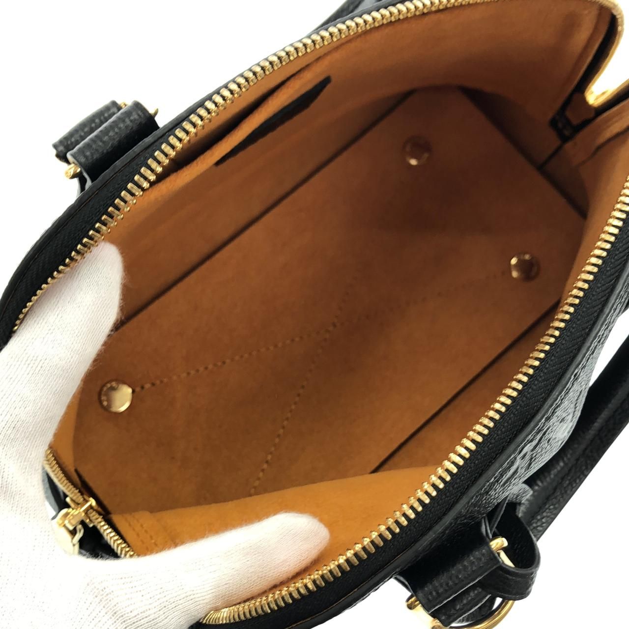 Louis Vuitton Monogram Empreinte Neo Alma BB — view 9