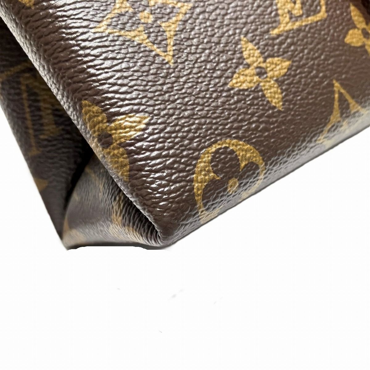Louis Vuitton Locky BB Monogram Handbag Leather — view 8