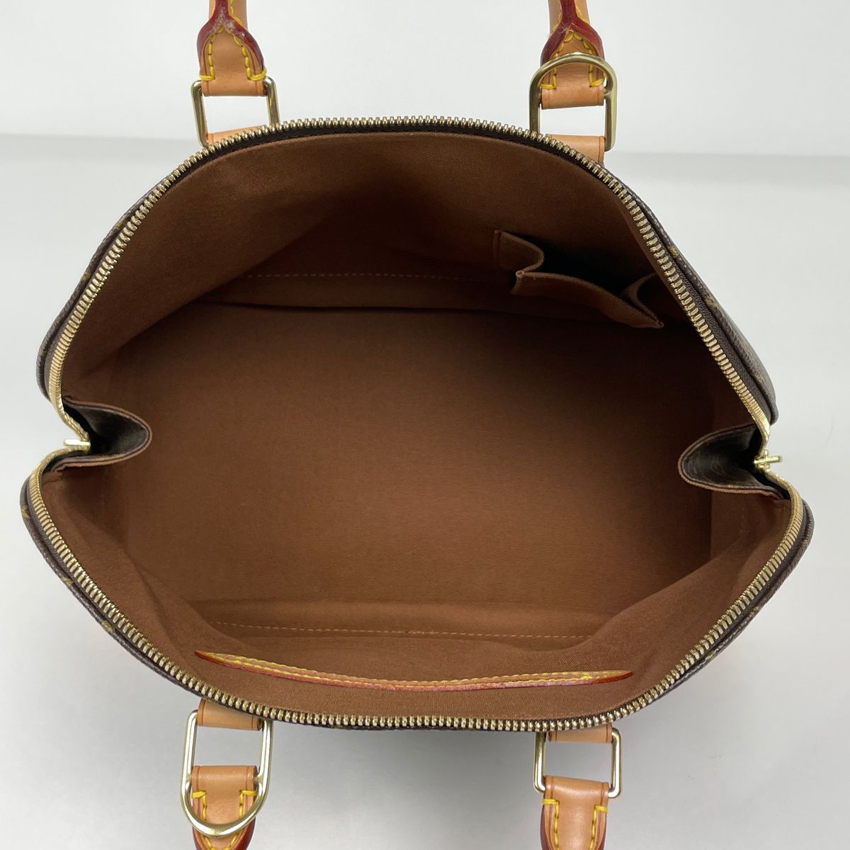 Louis Vuitton Alma Handbag Monogram Brown — view 8