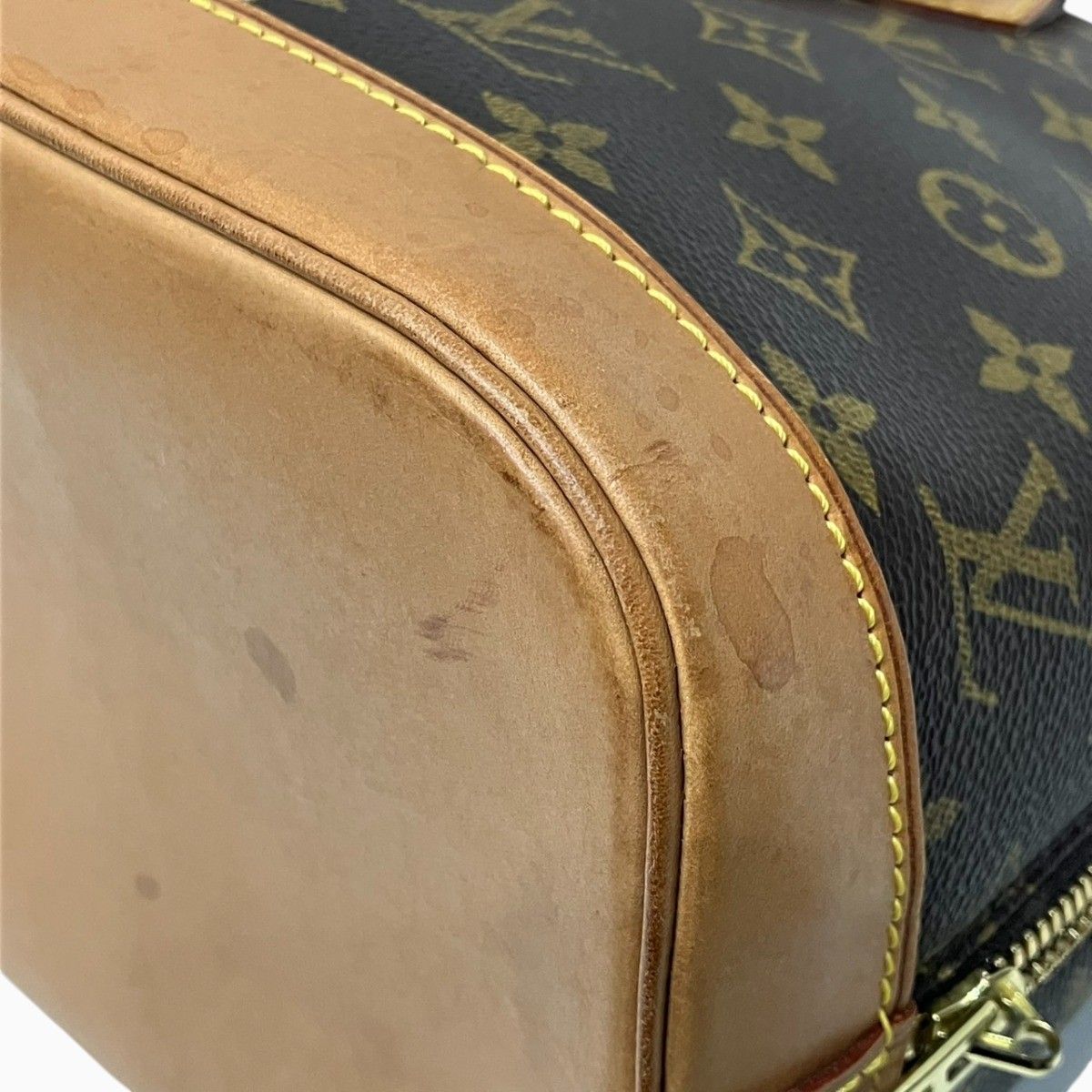 Louis Vuitton Alma Monogram Handbag Canvas — view 8