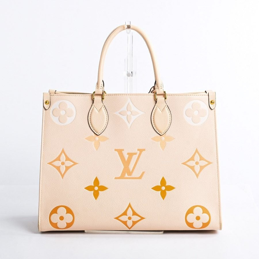 Louis Vuitton On The Go Tote Empreinte By The Pool Onthego MM Cream