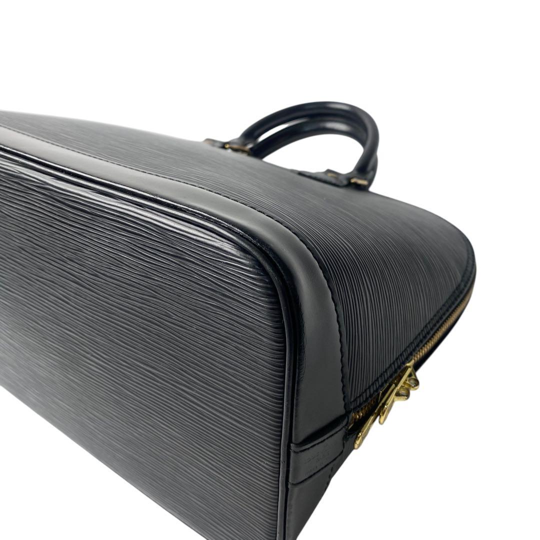 Vuitton Louis Vuitton Epi Alma Handbag With Keys And Cadenas