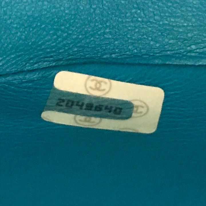 Chanel CC Logo Turnlock Quilted Lambskin Mini Hand Vanity Bag Blue