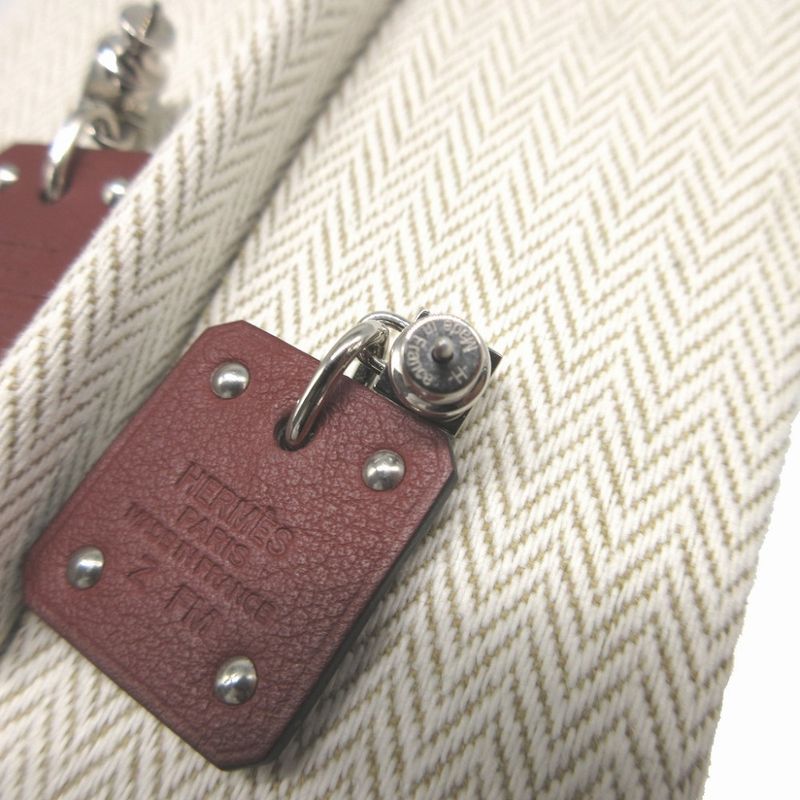 Hermes Asdecourt Z Engraved (2021) Heart Leather Metal Brown Silver Earrings