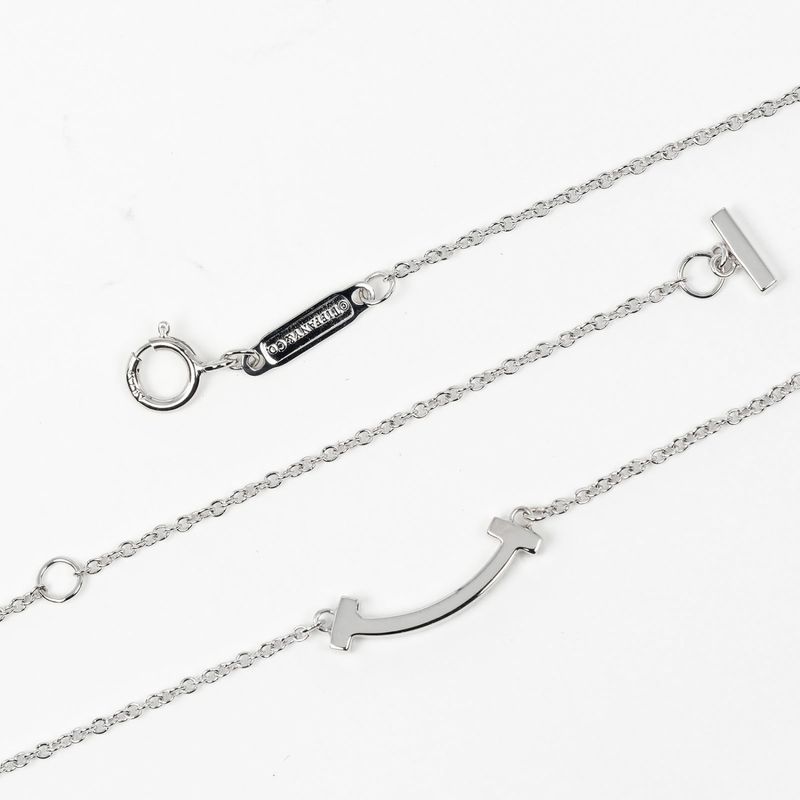 Tiffany & Co T-smile Mini 18K White Gold And Pink Sapphire Ladies 2.43g Necklace