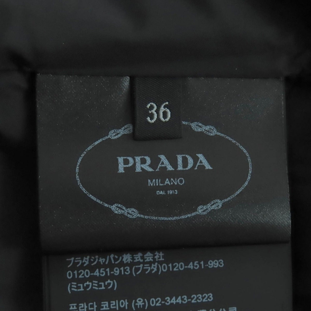 Prada 24 AW 29 S131 100% Virgin Wool Triangle Logo Plate Leather Belt Down Vest — view 11