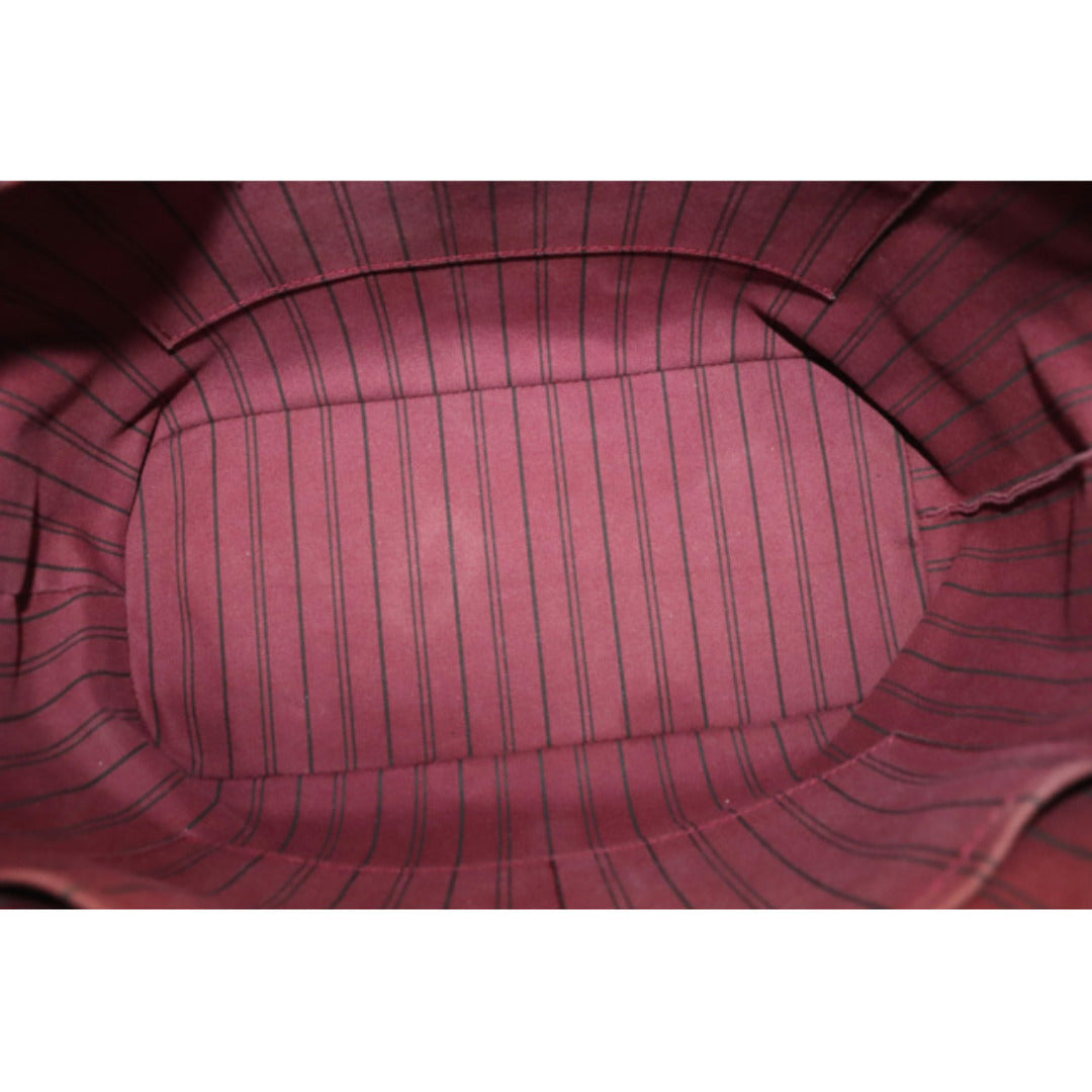 Louis Vuitton Empreinte Mazarine MM Handbag
