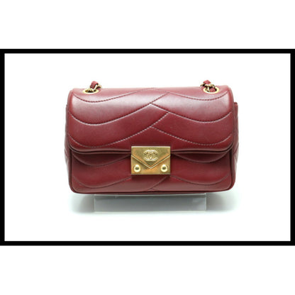 Chanel Wave Stitch Push Lock GD Metal Fittings