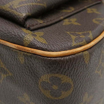 Louis Vuitton Handbag Exantri Cité Monogram Canvas Monogram Gold Hardware Brown
