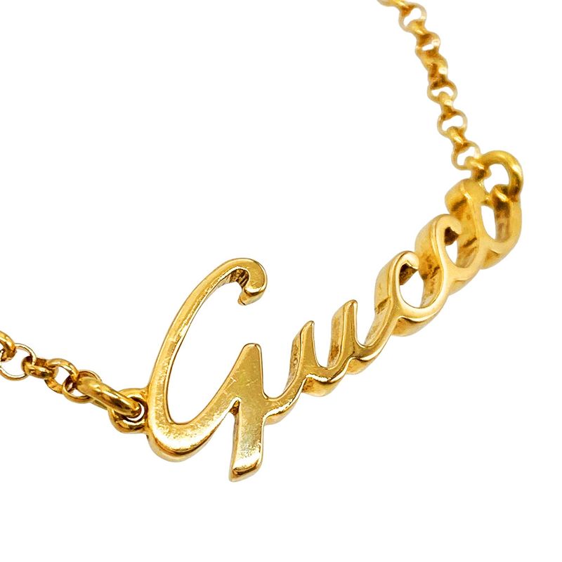 Gucci Logo Graffiti Signature Bracelet 18K Yellow Gold 55g Yellow Gold Ladies