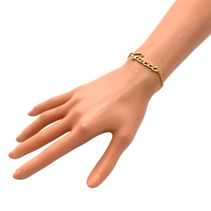 Gucci Logo Graffiti Signature Bracelet 18K Yellow Gold 55g Yellow Gold Ladies