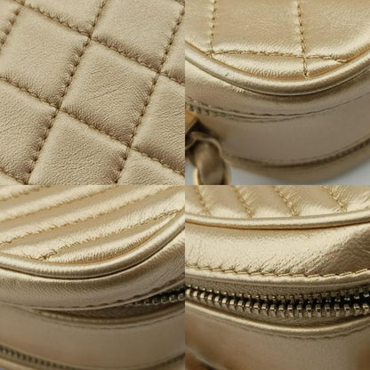 Chanel Coco Boy Camera Case Gold Lambskin A92655 20484370