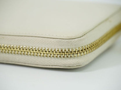 Authentic Saint Laurent Leather Round Zipper Long Wallet Long Wallet Ivory