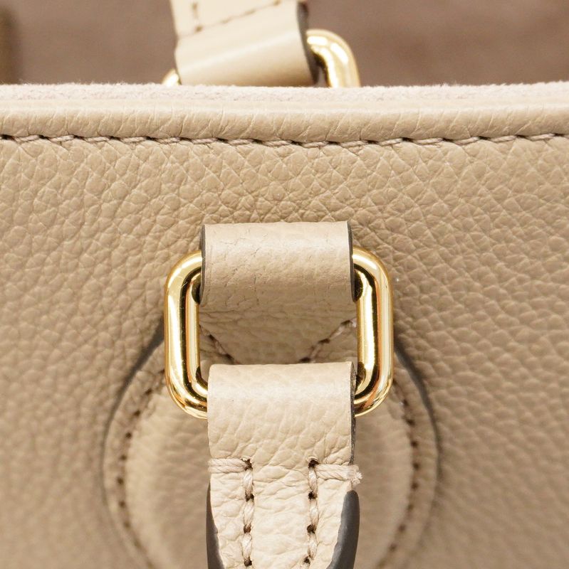 Louis Vuitton Tote Monogram/empreinte Bicolor On-the-go MM M45494 Tortolaire