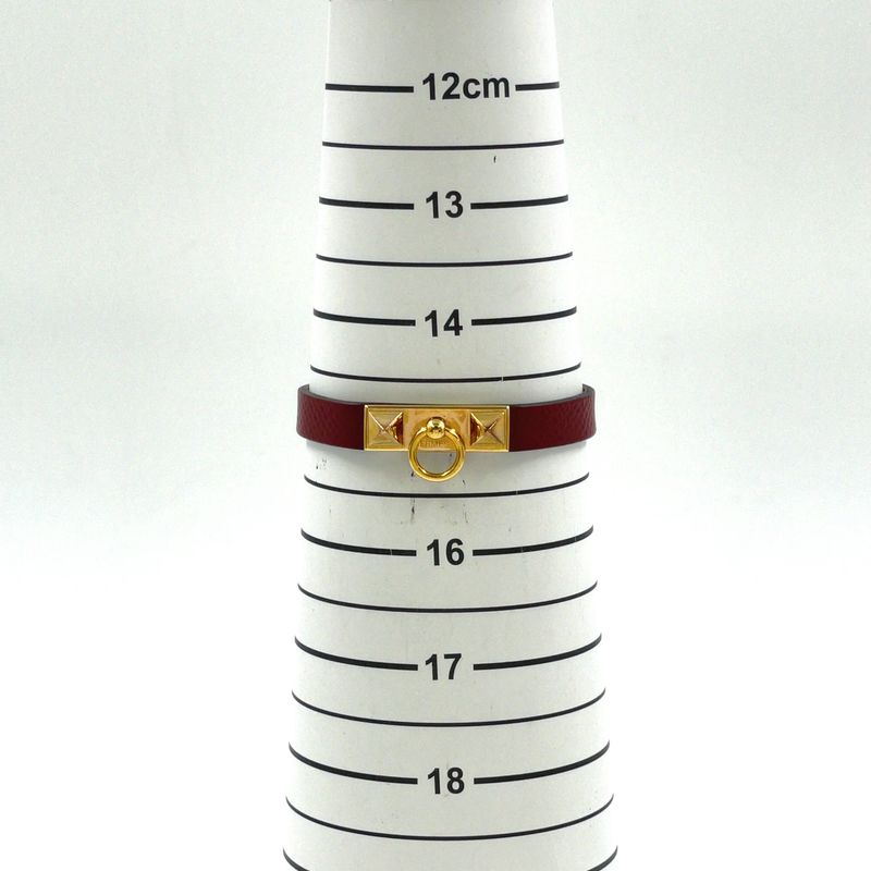Hermes Rival Mini X Engraved Leather Red Bracelet With Gold Bangle