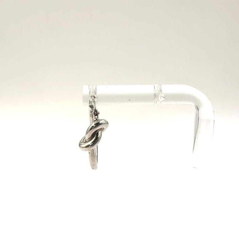 Celine Knot Small Hoop Rhodium Finish On One Side Only Metal Silver Earrings