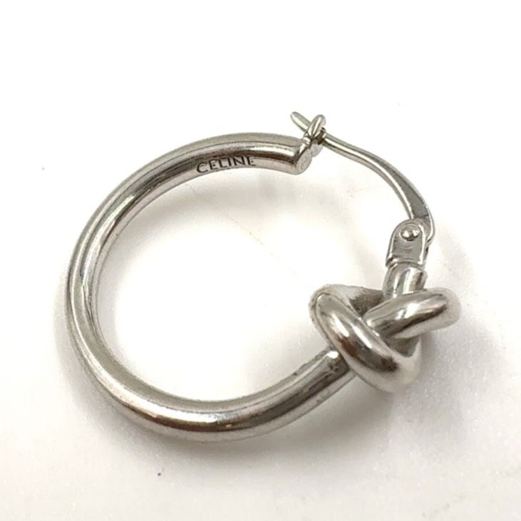 Celine Knot Small Hoop Rhodium Finish On One Side Only Metal Silver Earrings