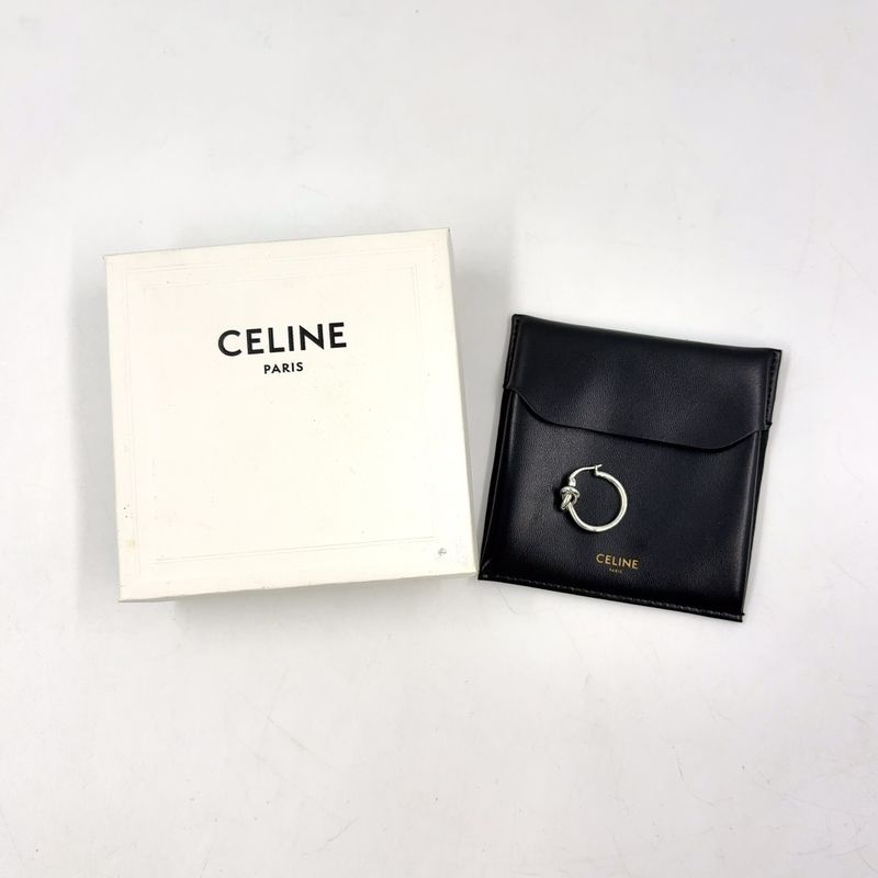 Celine Knot Small Hoop Rhodium Finish On One Side Only Metal Silver Earrings