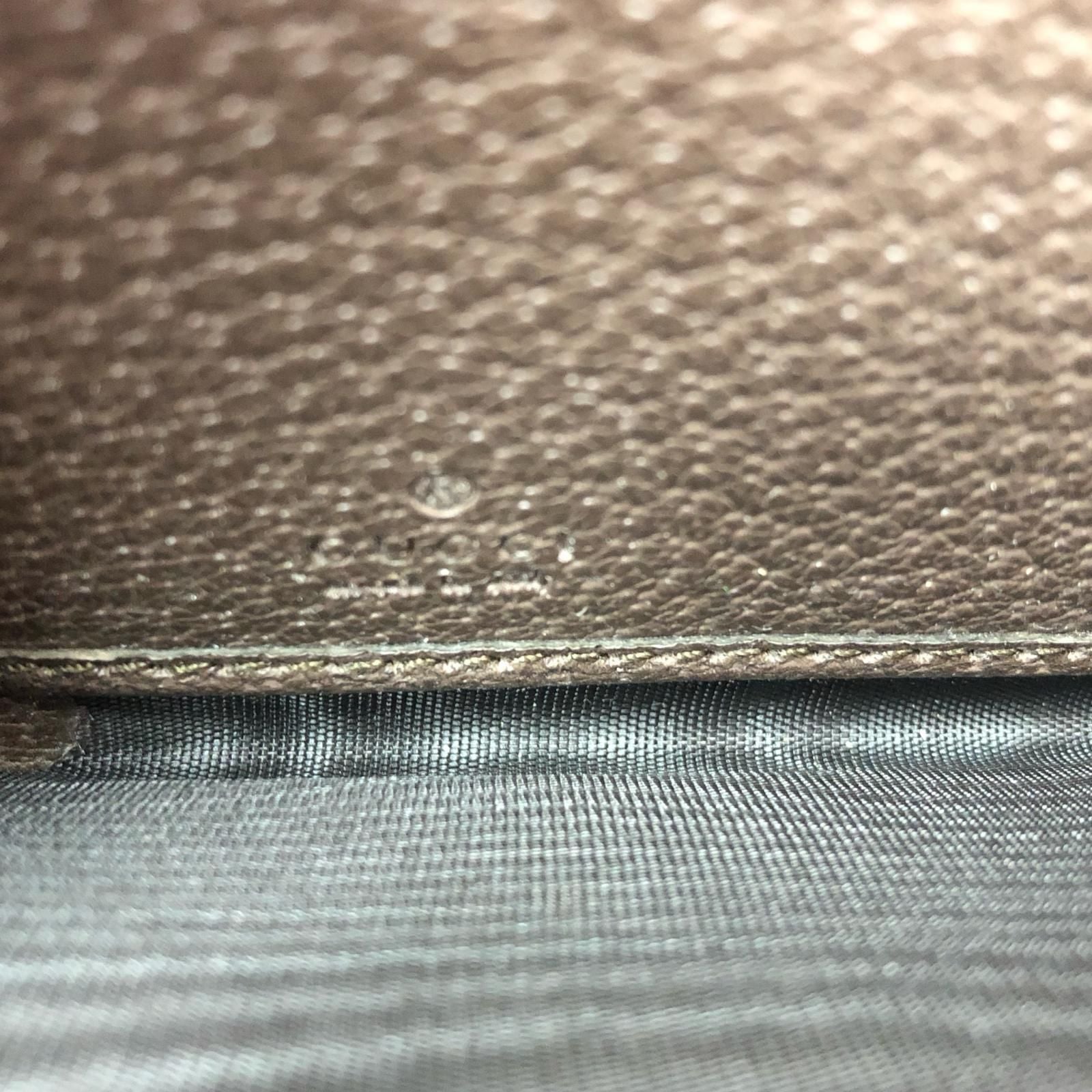 Gucci Women's Long Wallet Round Zipper GG Supreme Courier Round Zippy Taiga