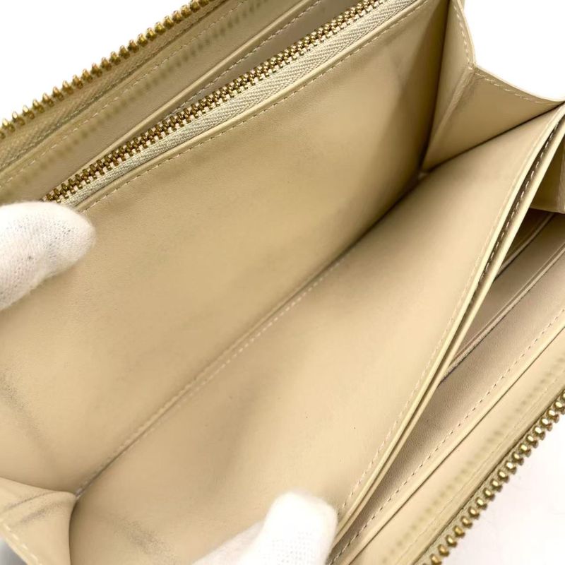 Louis Vuitton Zippy Round Zipper Enamel Leather Yellow Wallet Gold M90142