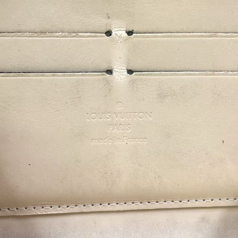 Louis Vuitton Zippy Round Zipper Enamel Leather Yellow Wallet Gold M90142