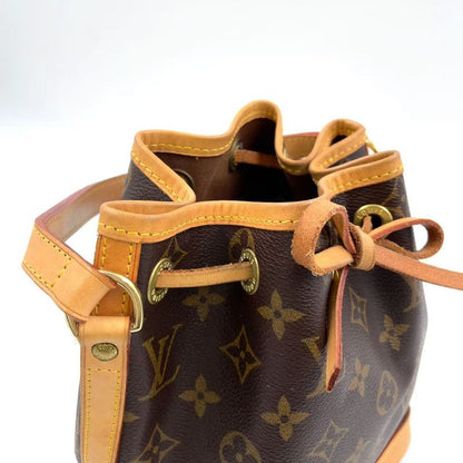 Louis Vuitton Mininoe Monogram Leather X PVC Brown Handbag M42227