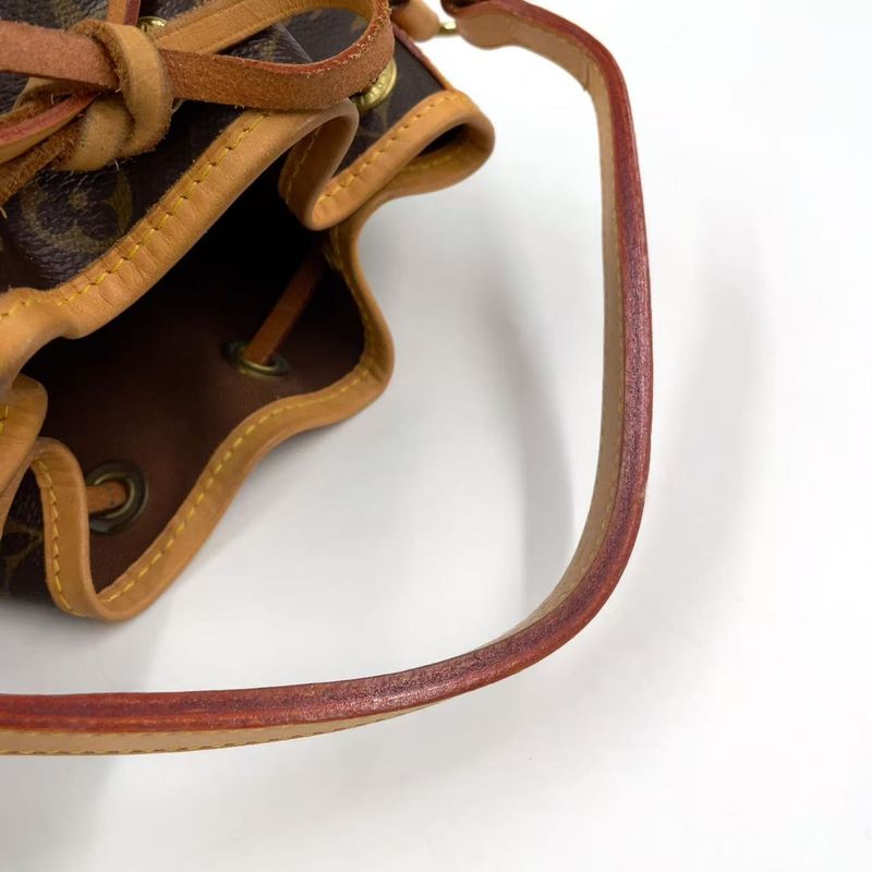 Louis Vuitton Mininoe Monogram Leather X PVC Brown Handbag M42227