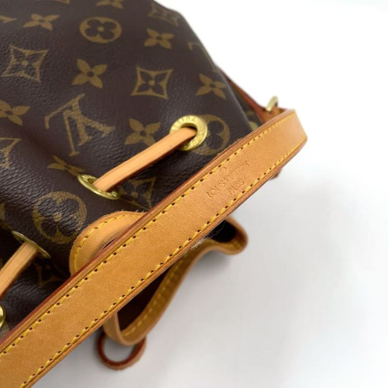 Louis Vuitton Mininoe Monogram Leather X PVC Brown Handbag M42227