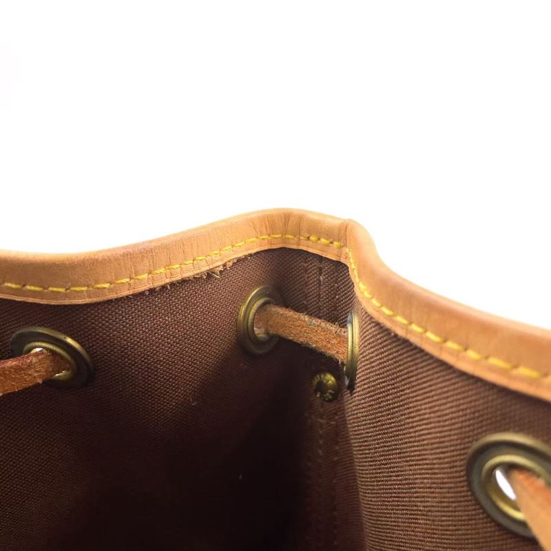 Louis Vuitton Mininoe Monogram Leather X PVC Brown Handbag M42227