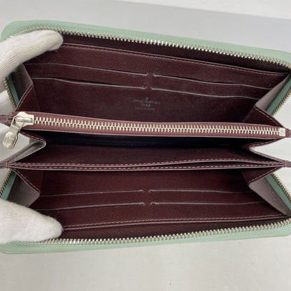 Louis Vuitton Epi Zippy Wallet M60313 Amande Electrique Cles Deuce