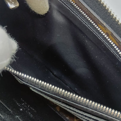 Louis Vuitton Monogram Macassar Zippy Dragonne Long Wallet M69407 Brown with