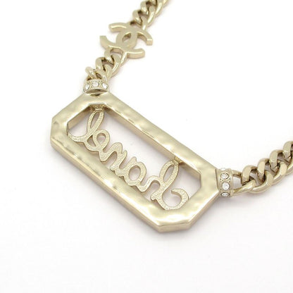 Chanel Necklace - Gold Ivory And Clear Logo Motif