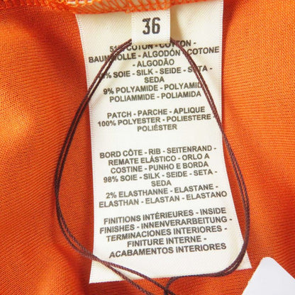 Hermes 3e4610dg Silk Blend Long Sleeve Pullover/top With Serie Patch Camel 36
