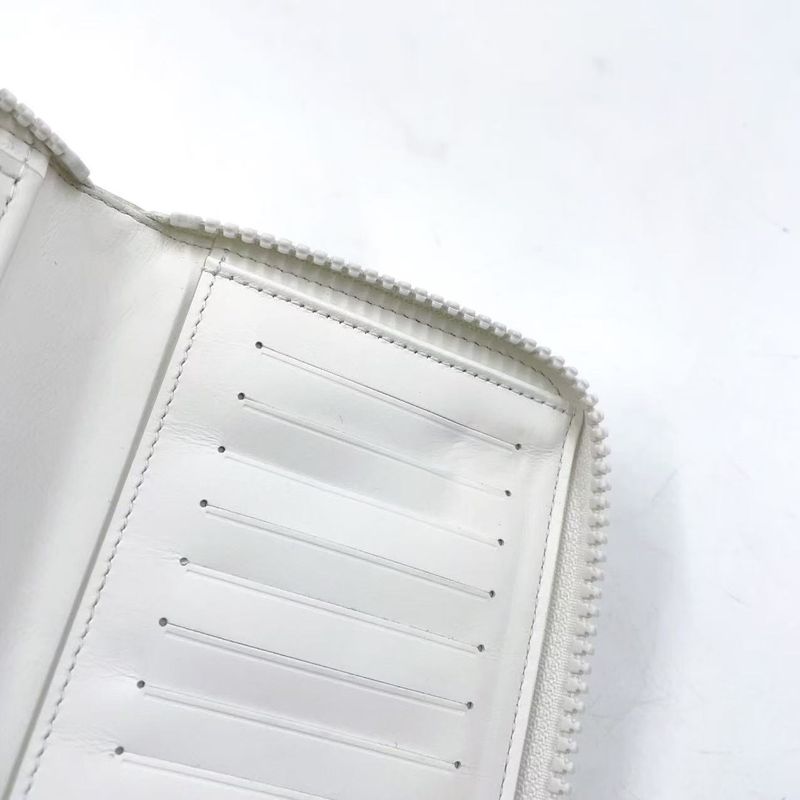 Louis Vuitton Zippy Wallet Vertical LV Friend RFID Reaction Taurillon Leather