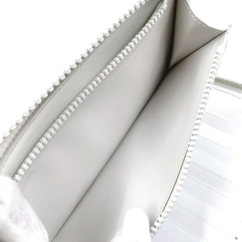 Louis Vuitton Zippy Wallet Vertical LV Friend RFID Reaction Taurillon Leather