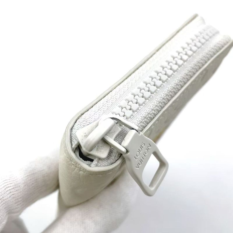 Louis Vuitton Zippy Wallet Vertical LV Friend RFID Reaction Taurillon Leather