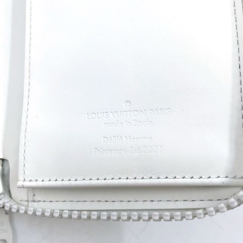 Louis Vuitton Zippy Wallet Vertical LV Friend RFID Reaction Taurillon Leather