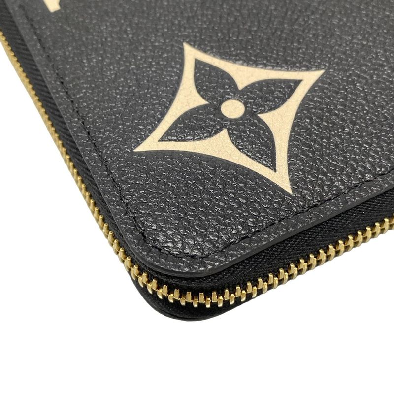 Louis Vuitton Long Wallet Bicolor Monogram Empreinte Tongue Zippy Wallet M80481